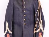 a blue military jacket with gold buttons and a white collar