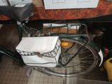 a bike with a basket on the back of it
