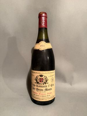 a bottle of wine that is sitting on a table