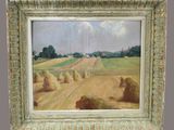 une peinture à l'huile représentant une scène de vie à la ferme, avec des balles de foin au premier plan