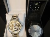 two watches that are sitting in a box