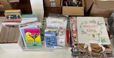 many boxes of cards and other items on the table