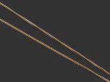 une paire de chaînes en or avec un pendentif en diamant sur fond noir