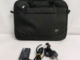 the bag is black and has a charger and a remote control