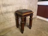 a small table with a book on top of it