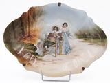 a plate with a picture of two women on it