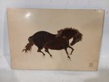 an image of a picture of a horse with a rider on it