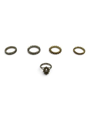 a set of five rings with different designs on a white background
