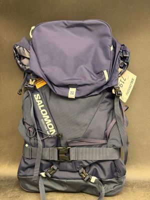 a backpack that is sitting on the ground