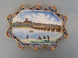 a picture of a decorative plate with a painting on it
