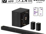 an image of a black sound bar with two speakers and a remote