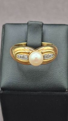 Bague jonc en or jaune 750/°° centrée d'une perle de culture… - Photo 1