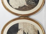 two framed pictures of a woman sitting on a bed and a man laying on the floor