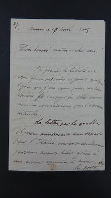 une vieille lettre écrite à la main sur un morceau de papier avec une écriture dessus