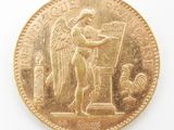 an image of a gold coin with an image of an angel on it