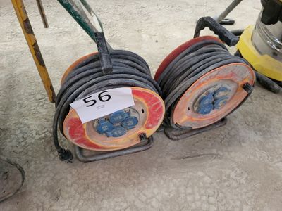 two hoses that are sitting next to each other on the ground