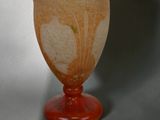 a vase that is sitting on a table in a room