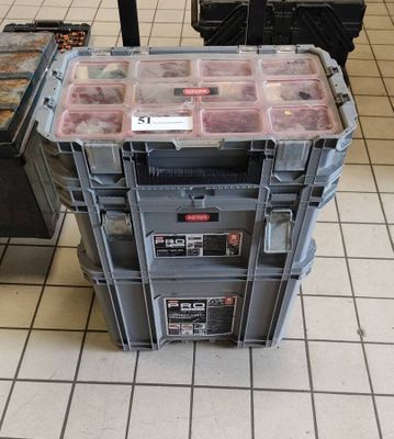 a large plastic box with a lot of different items in it