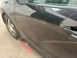 a car that is parked on the side of the street