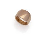 a close up of a gold ring on a white background