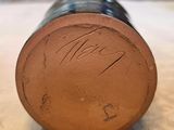an image of a close up of a baseball bat on a table