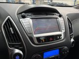 the dashboard of a car with a digital display in the center