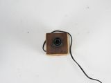 a small square object with a cord attached to it