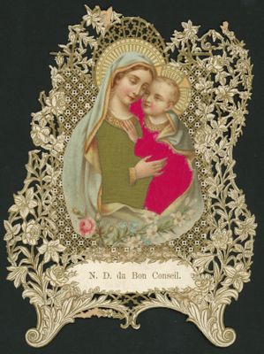 an old picture of a woman holding a child in her arms
