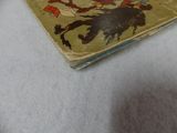 a book with a picture of a man riding a horse on it