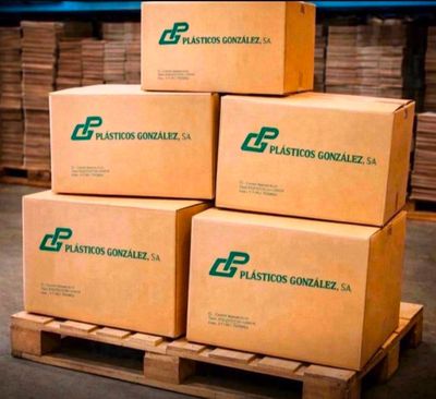 boxes stacked on a pallet in a warehouse with pallets in the background