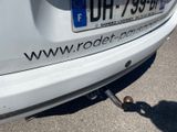 a close up of a car ' s license plate on the back of a car