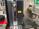 a coffee machine that is sitting on a table