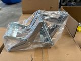 many pieces of furniture that are wrapped up in plastic