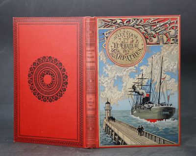 un livre rouge sur lequel figure l'image d'un bateau
