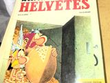 une pile de livres posée sur une table à côté d'une tasse