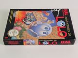 an image of a box of nintendo games on a white surface