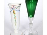 two vases sitting next to each other on a table