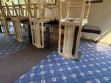 a room with a table and chairs in it