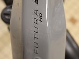a close up of a bike with a logo on it