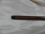 a pencil that is laying on a white sheet