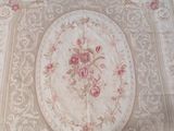 a picture of a table cloth with roses on it