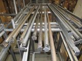 a lot of metal pipes that are in a room
