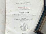 a book that is open on a table with a picture on it