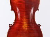 an old violin with a wooden back and a long neck