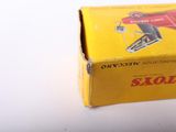 a yellow box with a picture of a man on skis in it