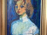 peinture d'une femme en robe bleue dans un cadre doré