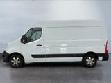 a white van that is parked in a parking lot