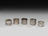 un lot de cinq ronds de serviette en argent