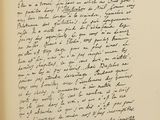 an old black and white photo of a handwritten letter in a book
