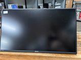 a close up of a monitor on a table in a store